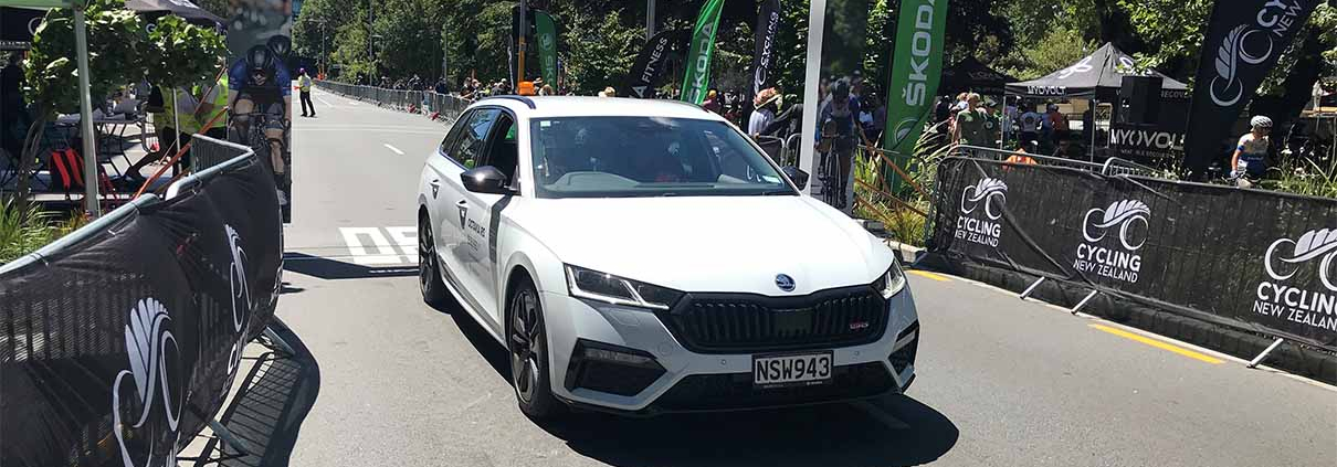 White OCTAVIA RS driving on a cycling race course in Christchurch.