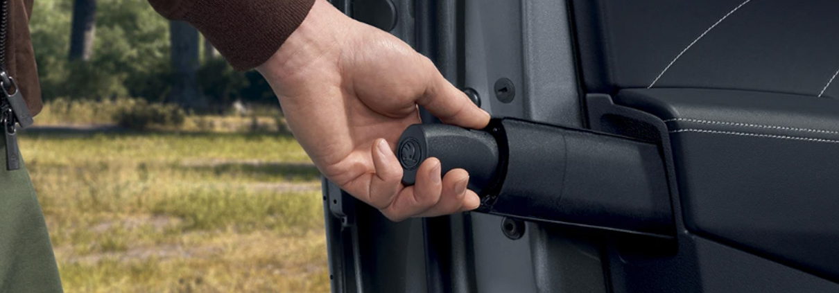 Škoda's Simply Clever features umbrella in door.