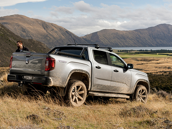 amarok on dry hill over lake